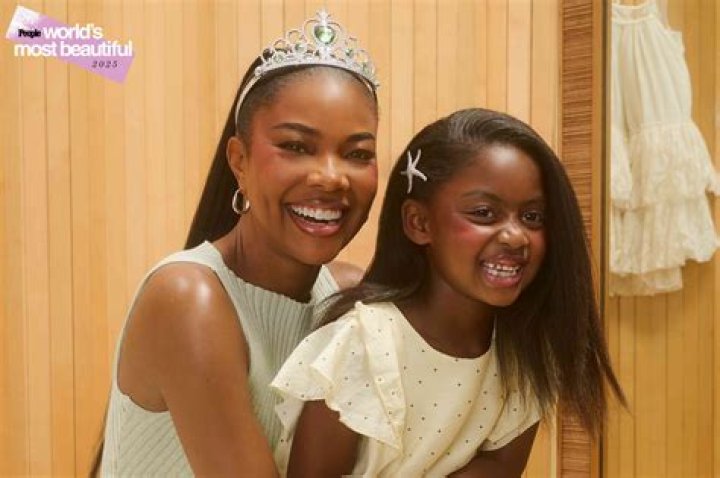 Gabrielle Union Dresses Daughter Kaavia, 11 Mos., In ‘Bring It On’ Uniform & Fans Freak
