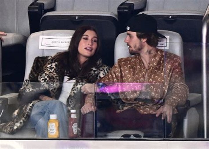 Hailey Bieber Shows Off Her Dark Brown Hair Makeover at the Super Bowl With Justin Bieber