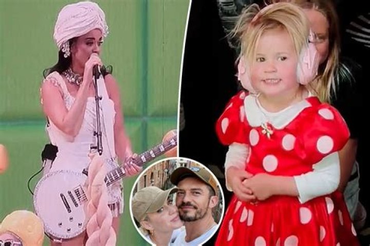 Katy Perry Carries Baby Daisy, 7 Months, While Strolling On The Beach in Striped Maxi Dress
