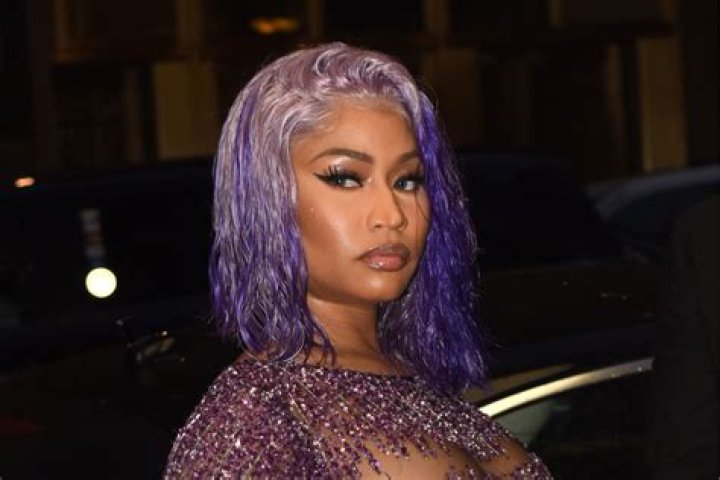 Lil Kim Claps Back At 50 Cent Over Nicki Minaj’s Child – Hollywood Life