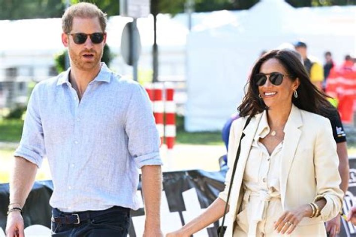 Meghan Markle & Prince Harry Gush Over Queen & Her ‘Legacy’ While Giving Glimpse Of $14.7 Mil. Mansion