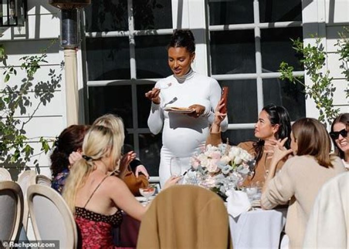Teyana Taylor Shows Off Her Growing Baby Bump In A Stunning Red Dress At Star-Studded Baby Shower